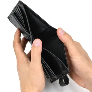 Detailed close-up view of black genuine leather wallet interior with multiple card slots.