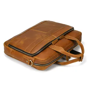 Men's genuine leather briefcase detail view, retro business laptop bag with dual handles and zip.