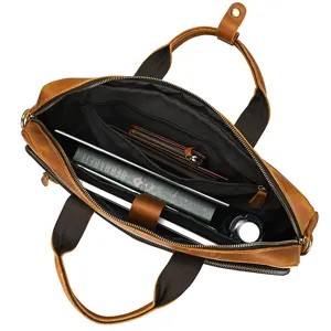 Interior detail view of genuine leather business briefcase showing spacious compartments and laptop space.