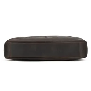 Detailed bottom view of a premium dark brown genuine leather business briefcase for men.