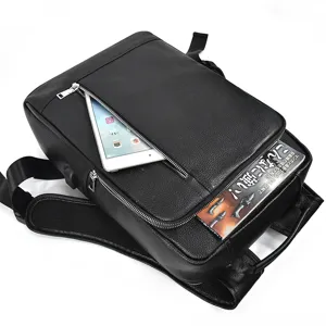 Men minimalist business laptop backpack with USB charging port, fine leather detail view.