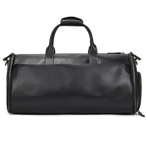 Black leather travel duffel bag with multiple compartments, waterproof gym and suit storage.