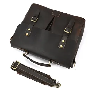 Detailed view of vintage crazy horse leather men briefcase with shoulder strap in dark brown color.