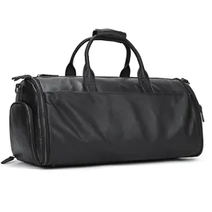 Black leather travel duffel bag detail, multi-functional gym bag and luggage organizer.