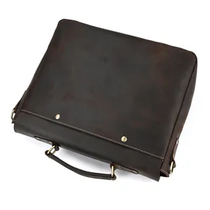 Detailed view of vintage brown crazy horse leather men briefcase with durable metal hardware.