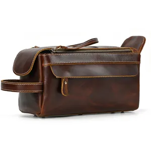 Genuine leather toiletry bag detail showing premium crazy horse texture and sturdy metal zipper.