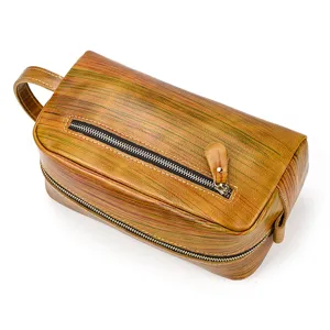 Vintage genuine leather toiletry bag with zipper, multi-functional cosmetic storage clutch.