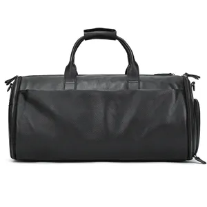 Black leather travel duffel bag with large capacity, durable handles and zipper compartments.