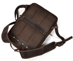 Detailed view of the dark brown crazy horse leather backpack back mesh and shoulder strap.