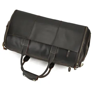 Genuine leather vintage travel duffel bag with wet dry separation for gym and business trips.
