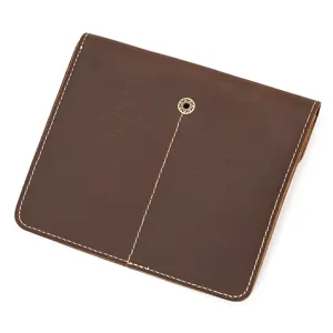 Detail view of vintage crazy horse leather watch pouch with durable white stitching and secure snap.