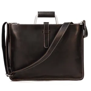 Cartable vintage pour homme en cuir veritable avec poignee en metal et bandouliere.