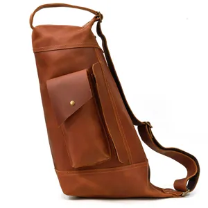 Close-up view of vintage genuine leather chest bag detail, showing premium stitching and hardware.