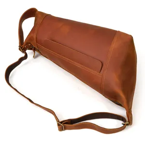Detail view of the retro crazy horse leather chest bag, showing durable stitching and hardware.