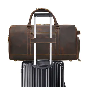 Vintage crazy horse leather travel duffel bag with luggage trolley sleeve for men and women.