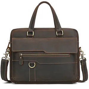 Detailed view of vintage brown leather briefcase, premium texture and bronze hardware.