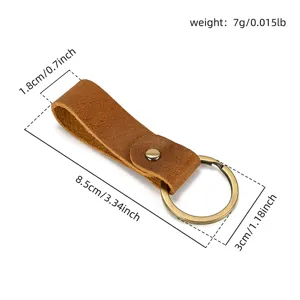 Handmade vintage crazy horse leather keychain with a sturdy metal ring and snap button.