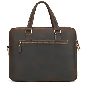 Detail view of the vintage brown genuine leather business briefcase with sturdy metal zippers.