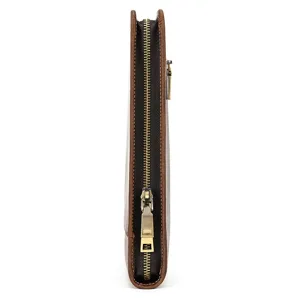 Side detail of brown genuine leather A4 document bag business clutch with durable metal zipper.
