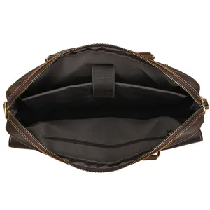 Vintage crazy horse leather briefcase interior detail, spacious laptop bag compartments.
