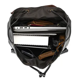Genuine leather backpack internal capacity detail view multi-compartment travel daypack