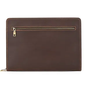 Close-up detail of the brown leather A4 document bag featuring neat stitching and front zipper pocket.