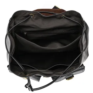 Detailed interior view of a stylish leather backpack with drawstring closure and pockets.