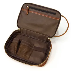 Vintage genuine leather double-layer toiletry bag interior detail for daily cosmetic storage.