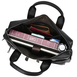 Detailed top-down view showing spacious interior compartments of the black leather laptop briefcase.