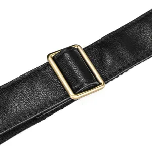 Genuine leather backpack strap detail showing durable hardware and fine texture stitching.