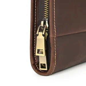 Genuine leather business document bag zipper detail, premium crazy horse leather craftsmanship.