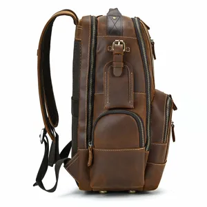 Detailed side view of vintage leather backpack showing multi-pocket design and zippers
