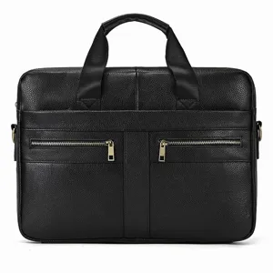 Closeup of black leather business briefcase with dual handles and front zipper pockets.