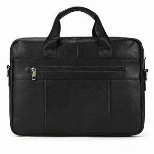 Black genuine leather business briefcase detail showing texture, handles, and front zipper pocket.