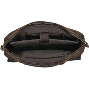 Detailed interior view of vintage crazy horse leather laptop briefcase with multiple compartments.