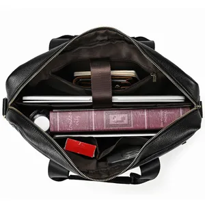 Leather briefcase internal structure detail showing spacious compartments and laptop pocket.
