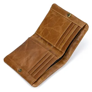 Men vintage leather bifold wallet with multiple card slots and secure snap button detail.