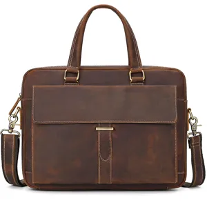 Detailed view of the premium brown leather briefcase hardware and stitching craftsmanship.