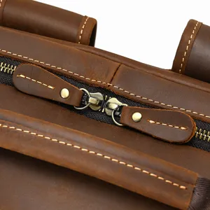 Close up view of men vintage crazy horse leather backpack zipper and stitch detail design.