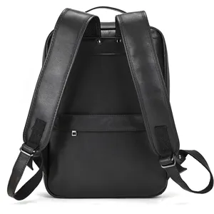Detail view of black leather backpack showing durable shoulder straps and refined craftsmanship.