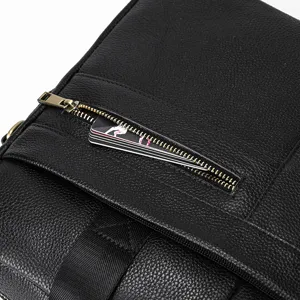 Black leather business men bag detail view showing zipper pocket and premium cowhide texture.