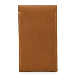 Close-up detail shot of brown genuine crazy horse leather watch storage pouch sleeve