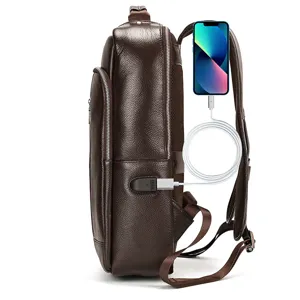 Men business genuine leather laptop backpack in brown featuring external USB charging port detail.
