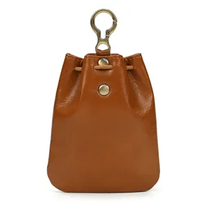 Detail shot of vintage leather coin purse with durable vegetable material and classic hardware.