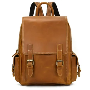Vintage genuine leather backpack for men, casual outdoor travel rucksack fits 14-inch laptop.