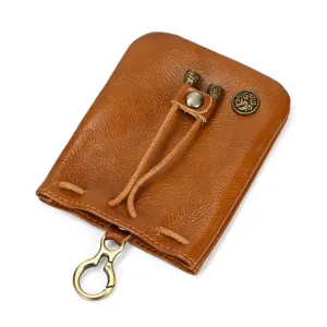 Vintage leather coin pouch, handmade mini retro change purse with metal hook and drawstring.