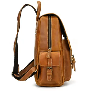 Side view detail of the vintage crazy horse leather backpack showing durable zipper and pockets.