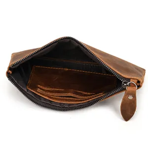 Monedero minimalista de cuero genuino estilo retro marrón con detalle de cremallera.