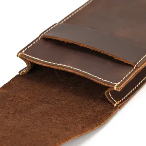 Vintage leather watch pouch detail showing exquisite stitching and premium mad horse texture.