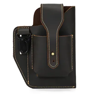 Vintage genuine leather phone holster detail, belt pouch with metal clip and snap button.